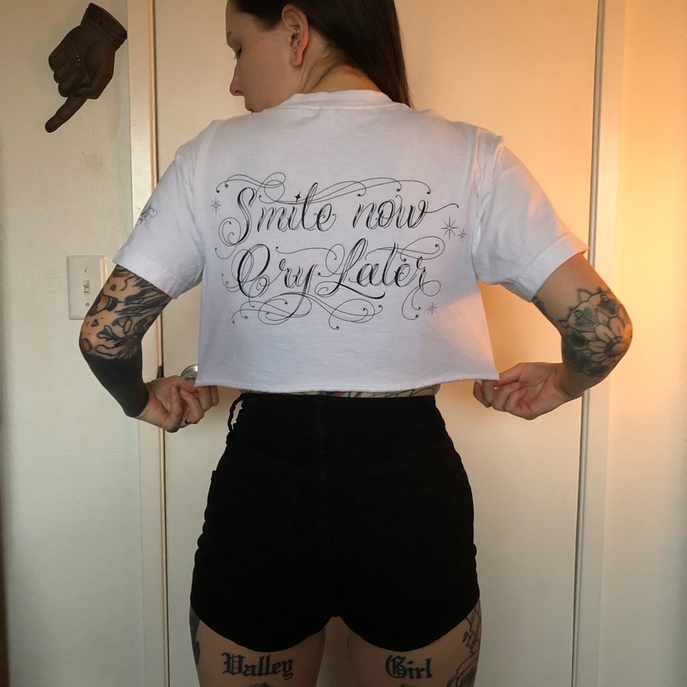 Em Scott “Smile Now Cry Later” crop top